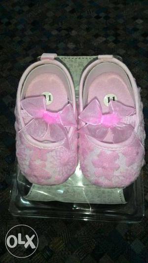 Pair Of Pink Flat Shoes