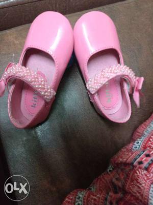 Pair Of Pink Leather Flats
