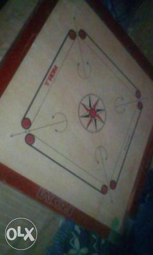 Red And Brown Carrom Board