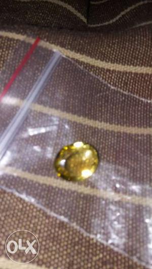 Round Yellow Gemstone In Plastic Pack