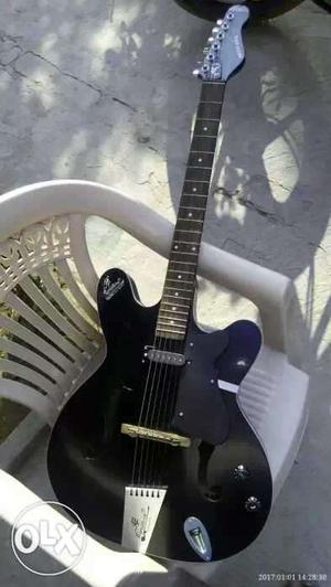 Semi Electric Guitar in new condition with bag