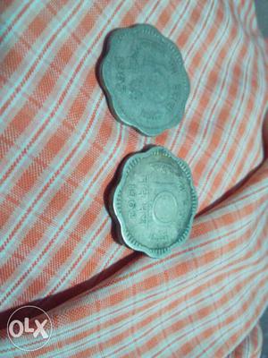 Two 10 Silver-colored Indian Paise Coins