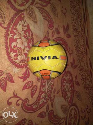 Yellow And Orange Nivia Volley Ball