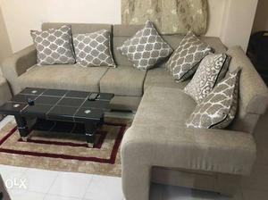 6 months gentally used L shaped sofa with center