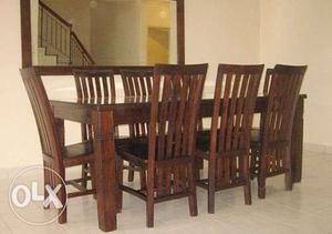8 seater dining table with chairs made of sheesham wood