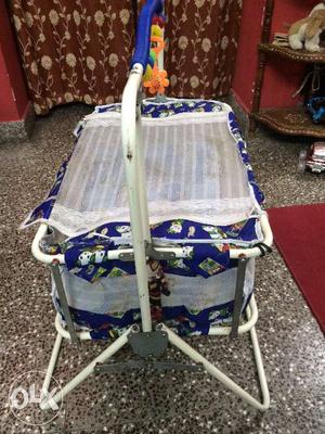 Baby cradle with net sparklingly used and in