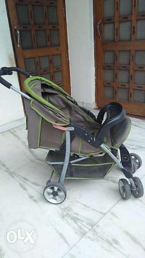 Baby's Gray And Black Stroller