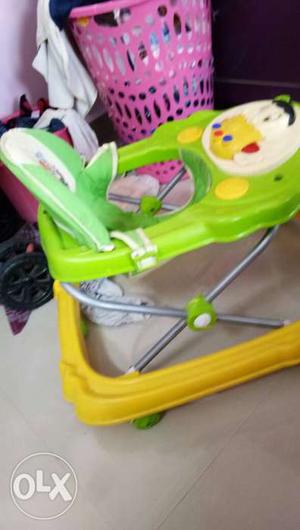 Baby's Green And Yellow Walker USED..