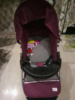 Baby's Red And Gray Jog Stroller