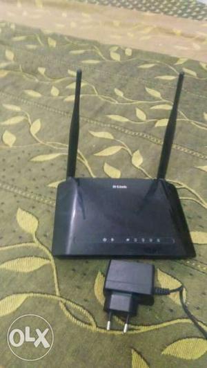 Black D-Link Wireless Router With Charger Adapter