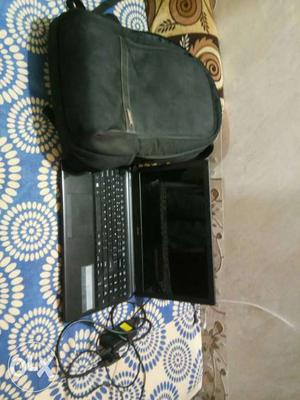 Black Laptop Computer And Black Backpack window 10