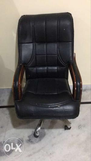 Brown And Black Leather Armchairs