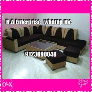 Brown And White Cushioned Couch With Center Table
