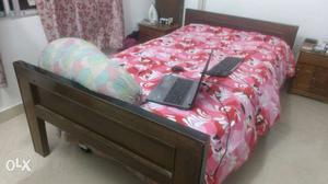 Brown wooden bed for sale, contact ASAP
