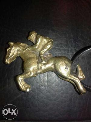 Gold-colored Man Riding Horse Pendant