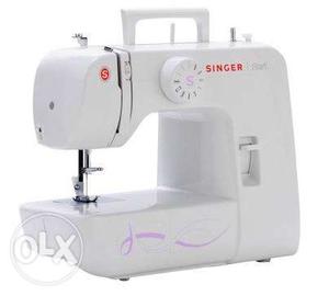 Singer sewing machine less used good and new like