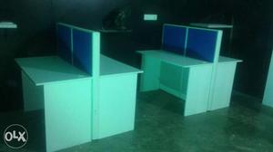Two White-and-blue Wooden Office Desks