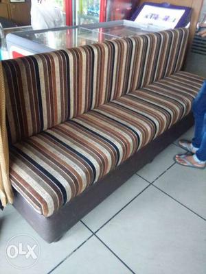 White, Brown, And Black Stripes Sofa