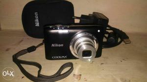 Black Nikon Coolpix Digital Camera With Bag