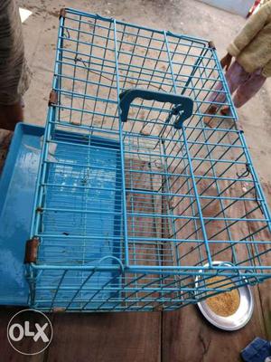 Blue cage for your pets. Height - 14.5" width. -