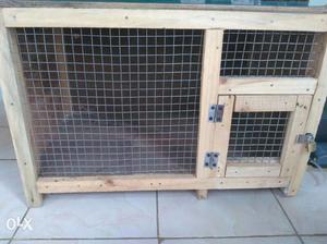 Brand new wooden bird cage. Dimension 65 x 44 cm