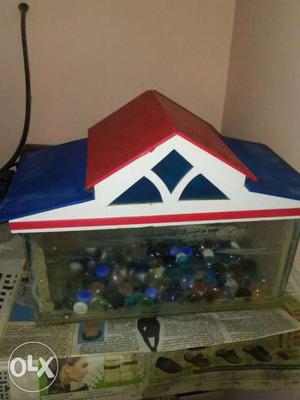 Fish tank with motor and tap cover and colour