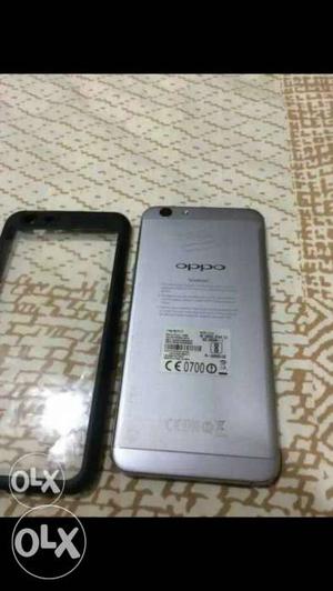 Gray Oppo Phone With Black Case