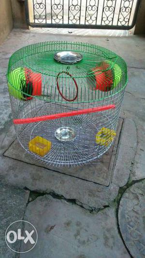 Green yellow metal cage for sale with all accessories/price