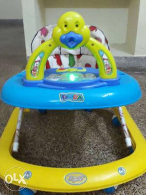 Baby walker with music in good condition