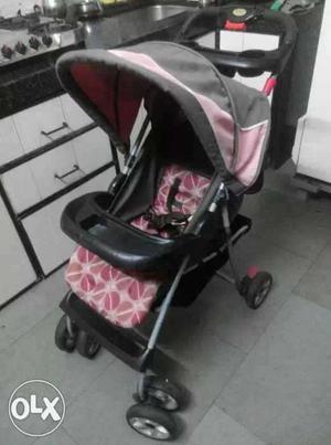 Baby's Black And Grey Stroller