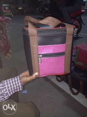 Black, Brown, And Pink Leather Handbag