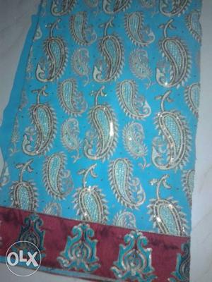Blue And Red Paisley Textile