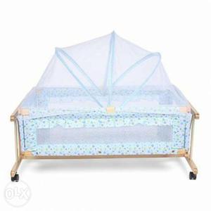 Blue cradle for baby with mosquito net from 0 to