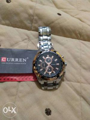 Curren watch with guarantee card