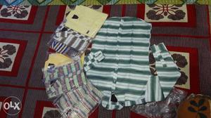 Full Shirts of different colors (Plain and Check) for Men.