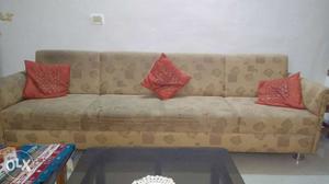 In good condition four seater sofa