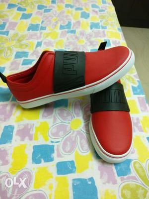 PUMA slipon sneakers. size 11.brand new. red n black