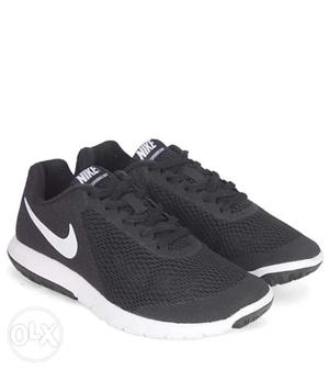 Pair Of Black-and-white Nike Running Shoes UK 5