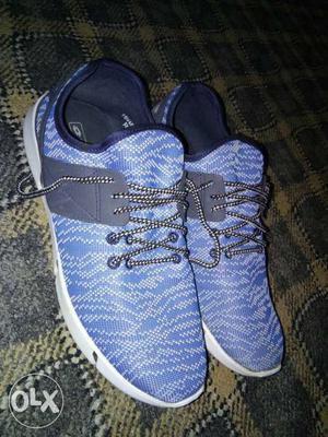 Pair Of Blue lotto shoes for runing