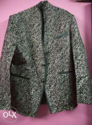 Party wear blazer coat in imported material.