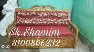 Red Couch With Brown Wooden Frame