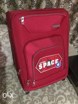 Red Soft-side Rolling Luggage