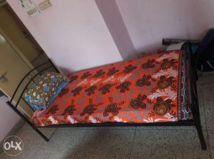 Rot iron single bed and kurl on matress