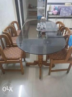Saga wood Dining Table with Six Chairs in Good