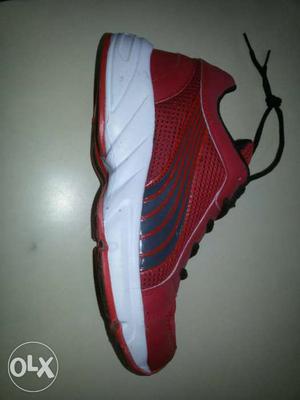 Unpaired Red And White Puma Shoe
