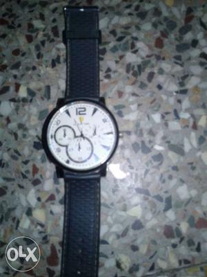 White Round Face With Black Leather Strap Watch