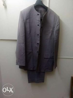 Wine color suit.exc.condin.fits 6. ft. height