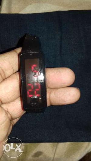 Wrist Band Digital Watch Shows Time & Date.
