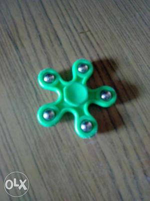 Green Plastic Spinner Fidget Toy