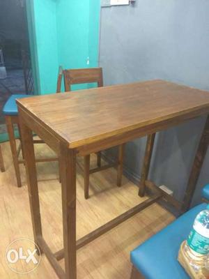 High Wooden Table with 4 Regzine Cushioned Wooden
